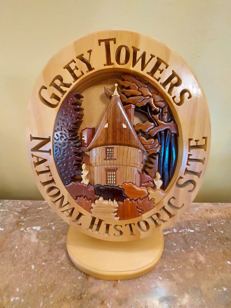 Intarsia sign of Grey Towers National Historic Site
